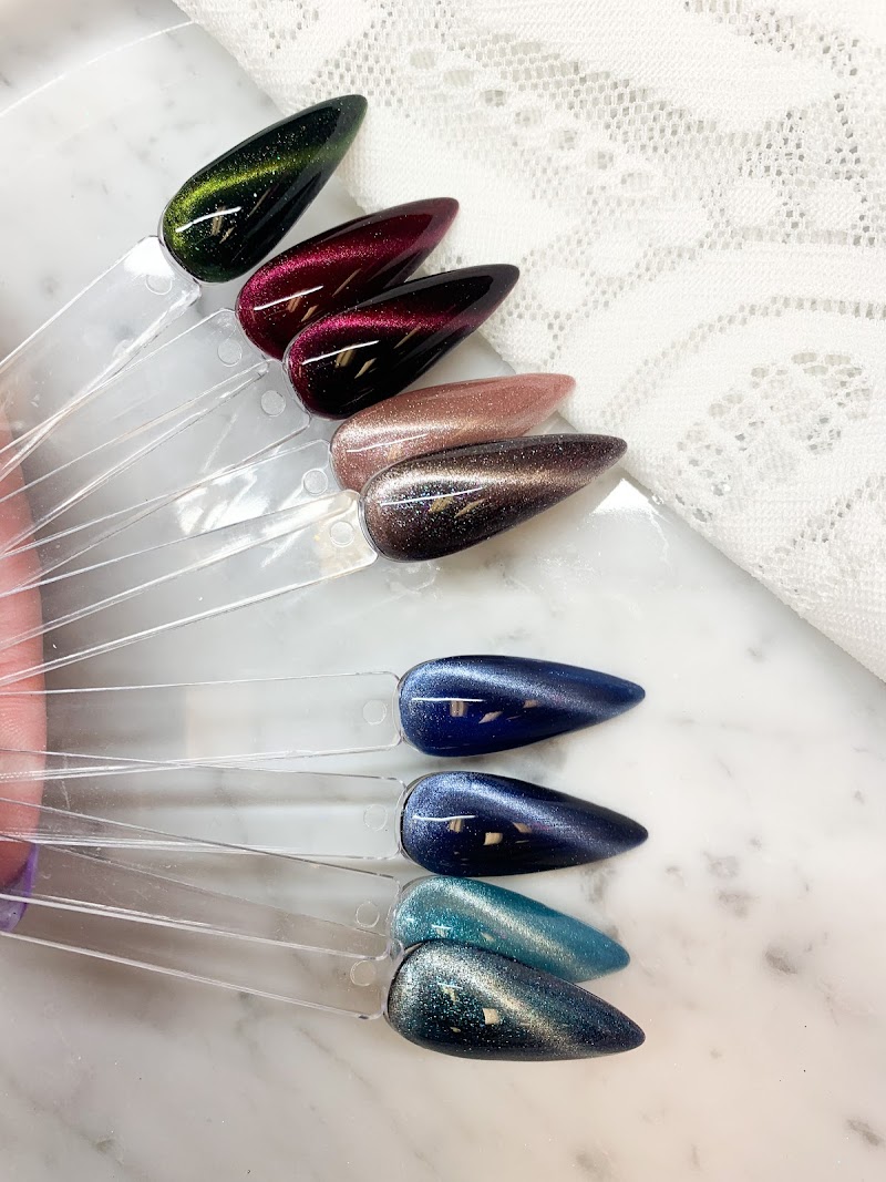 Nail Flight Salon tufted velvet bench and elegant blush interior