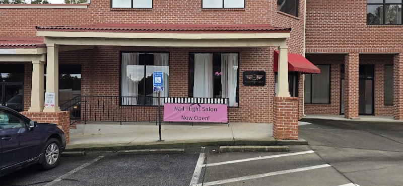 Nail color swatches and gel options displayed at Nail Flight Salon