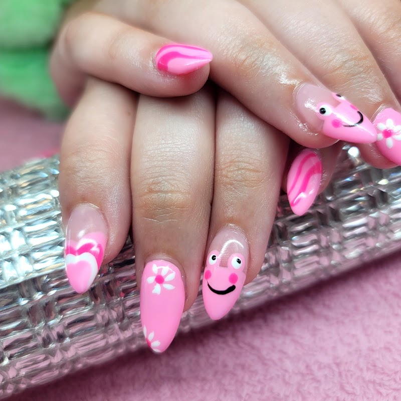 Cute pink nail art design created by Nail Flight Salon artists